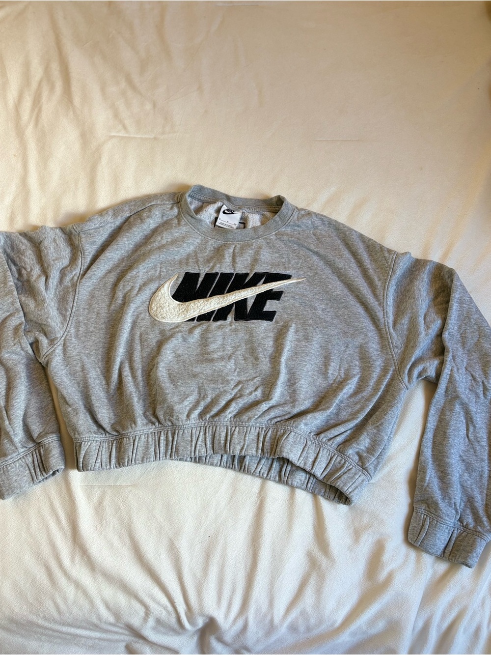 Nike Women's Light Gray Cropped Crewneck Sweatshirt with Black Logo